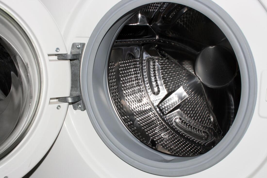 an open dryer ready for its load